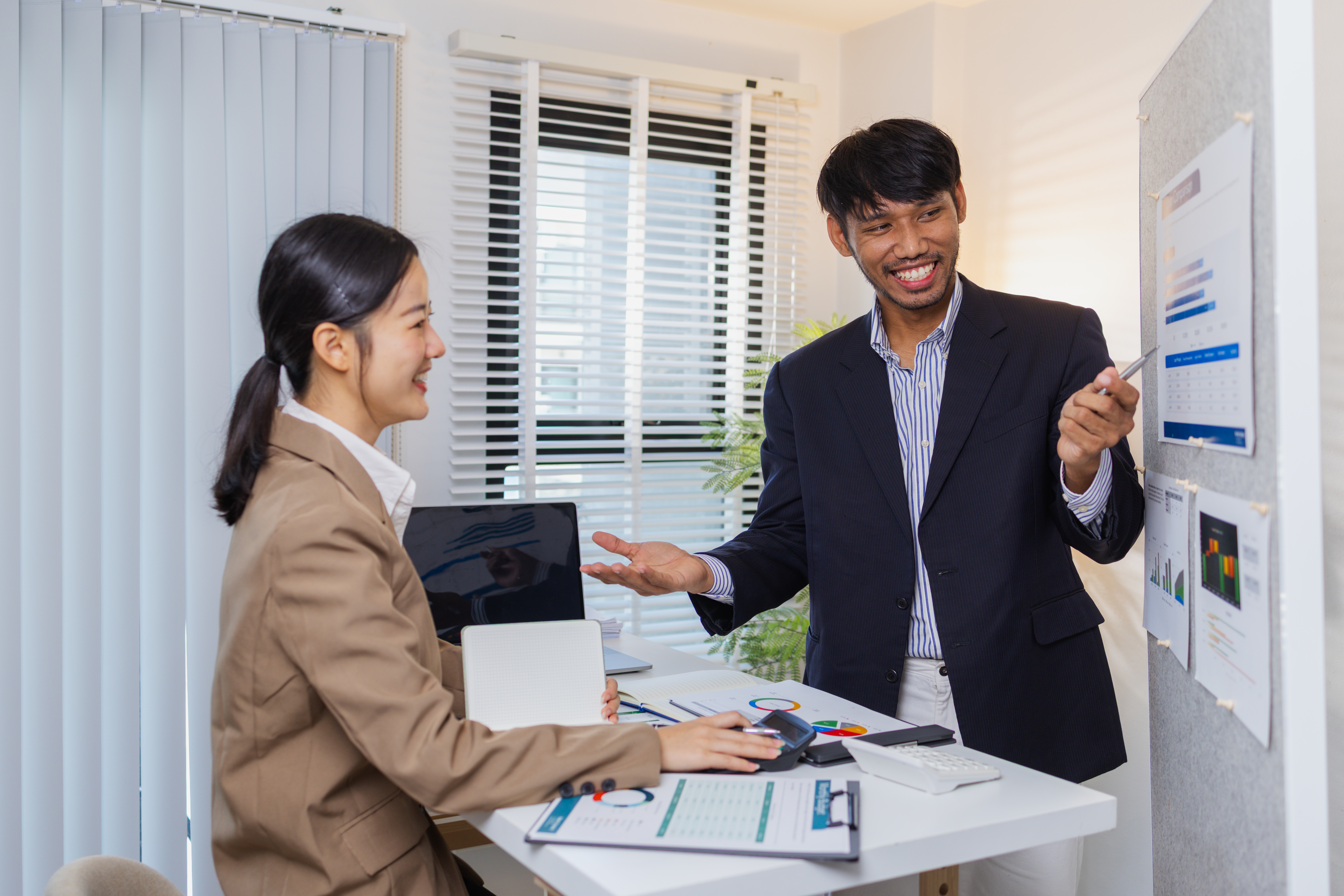 Two young professionals getting into sales
